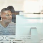 man using rehab software in treatment center